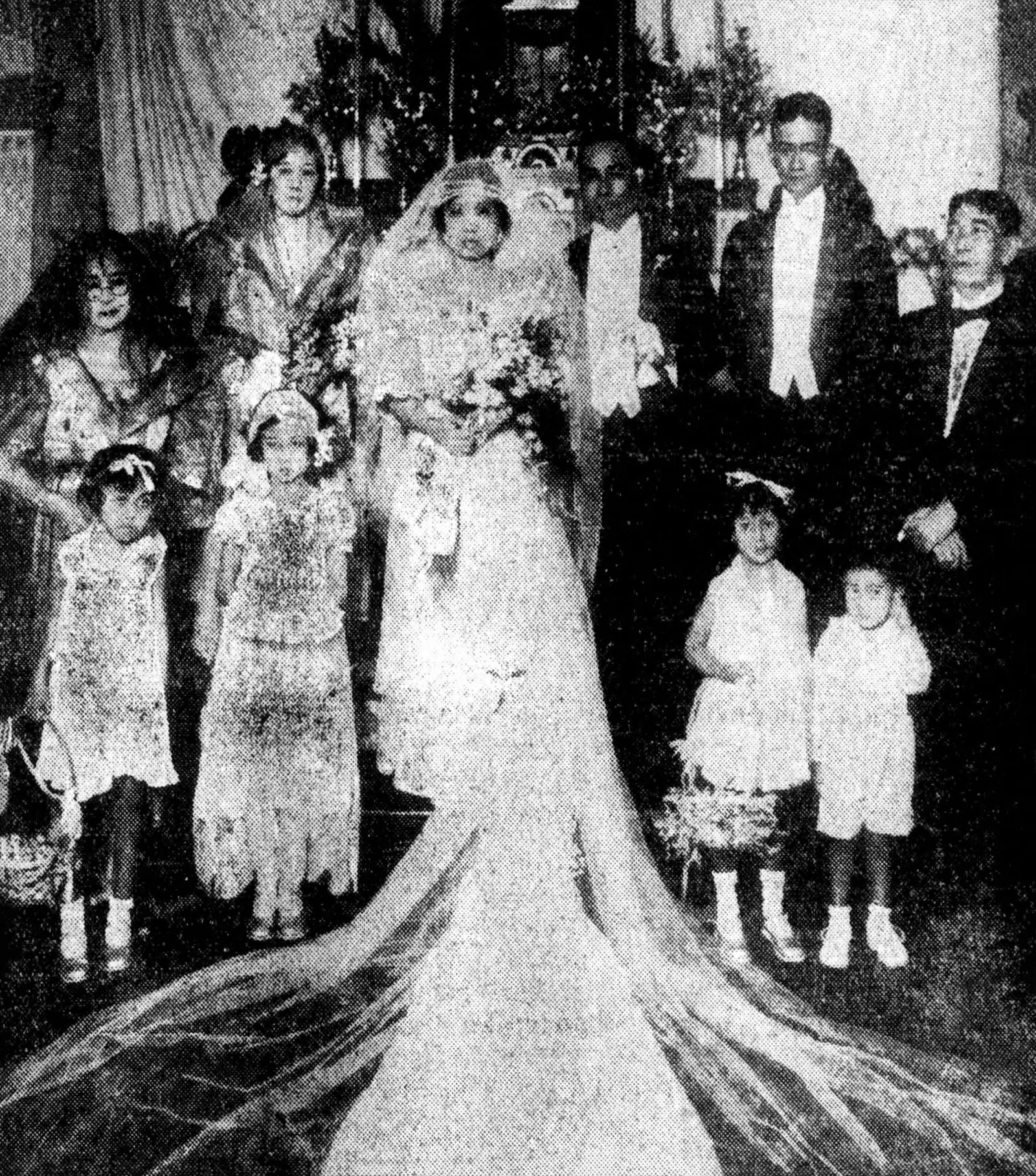A Manila wedding party on church steps, 1930