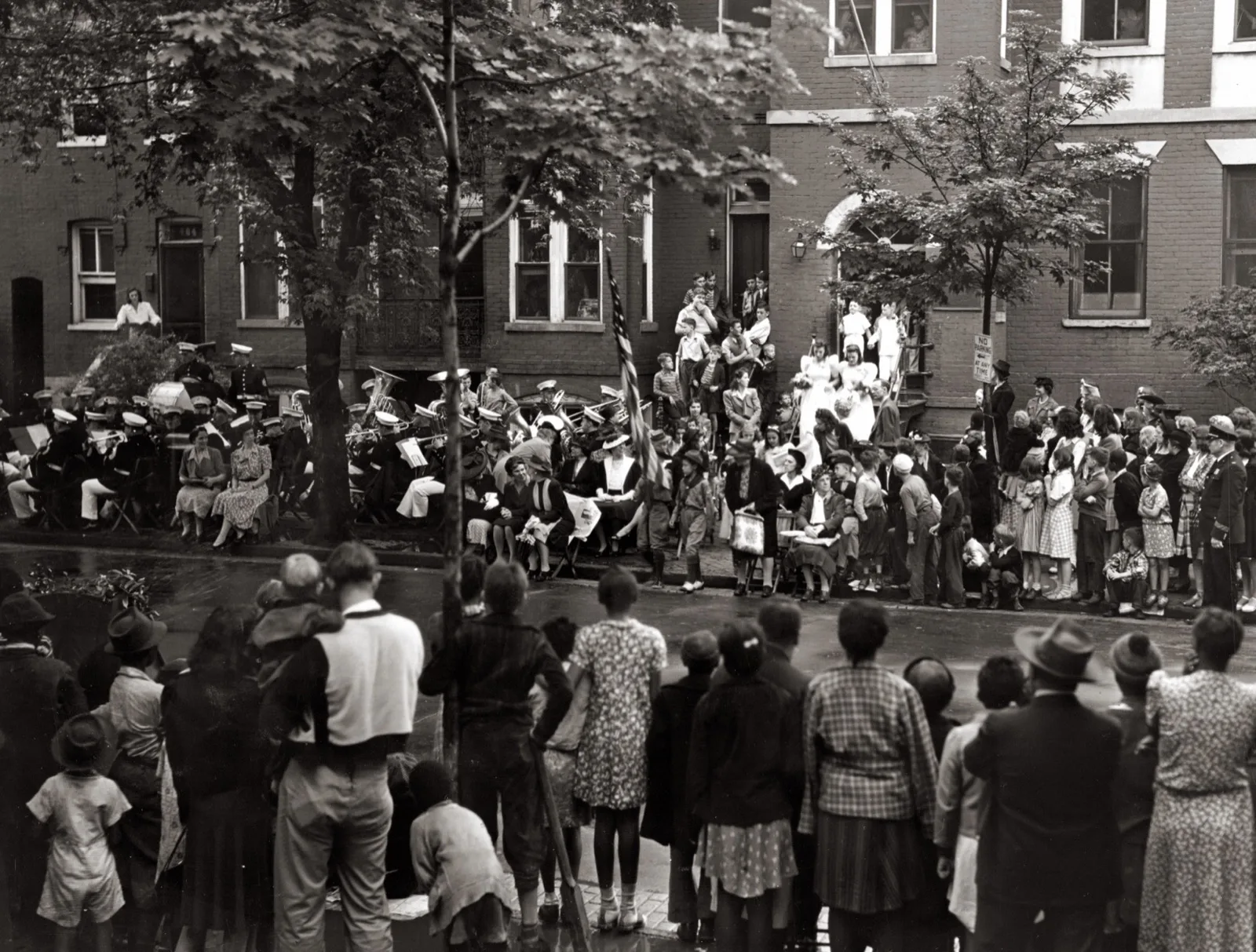 Children staging a mock wedding on a city street, 1938