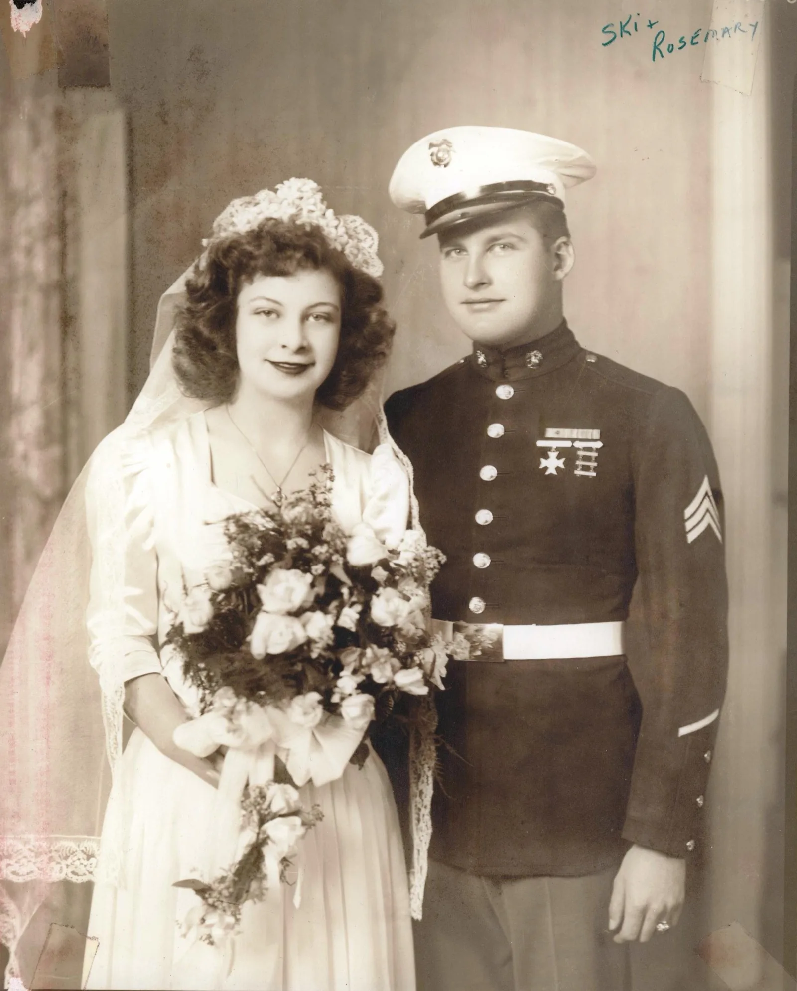 A wartime bride and a groom in uniform, about 1944