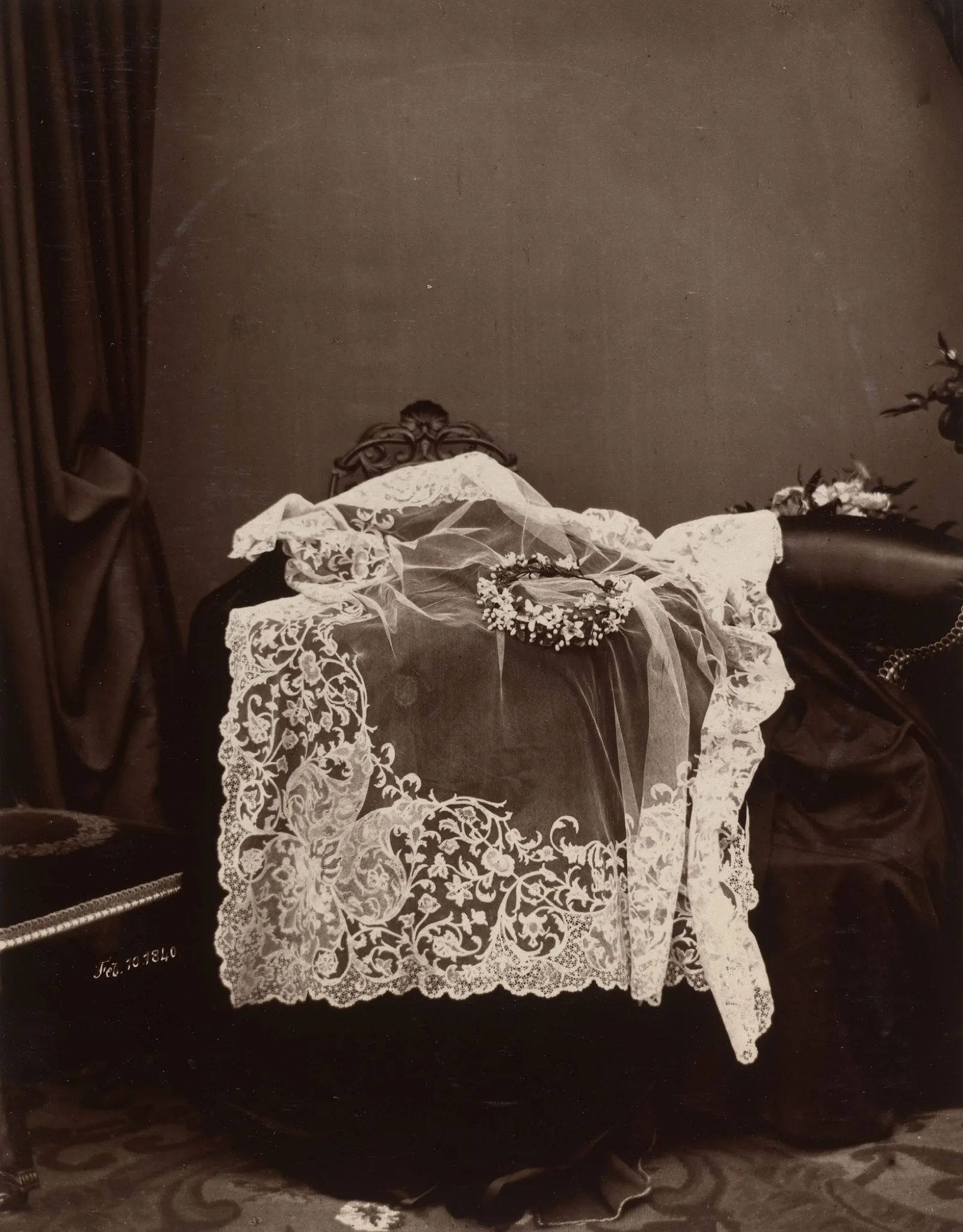 Queen Victoria’s Honiton lace veil and orange-blossom wreath laid out for the camera