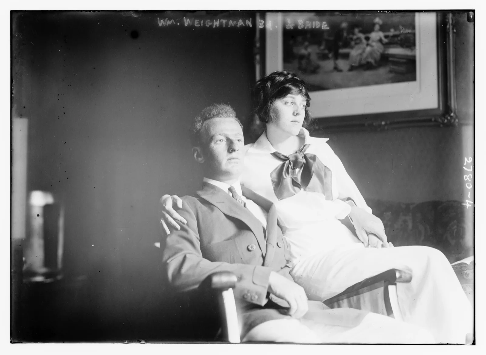 A bride and groom leaving a church, 1913 press photograph